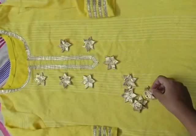 Hand-applied gota-patti star embroidery on Amoha fabric